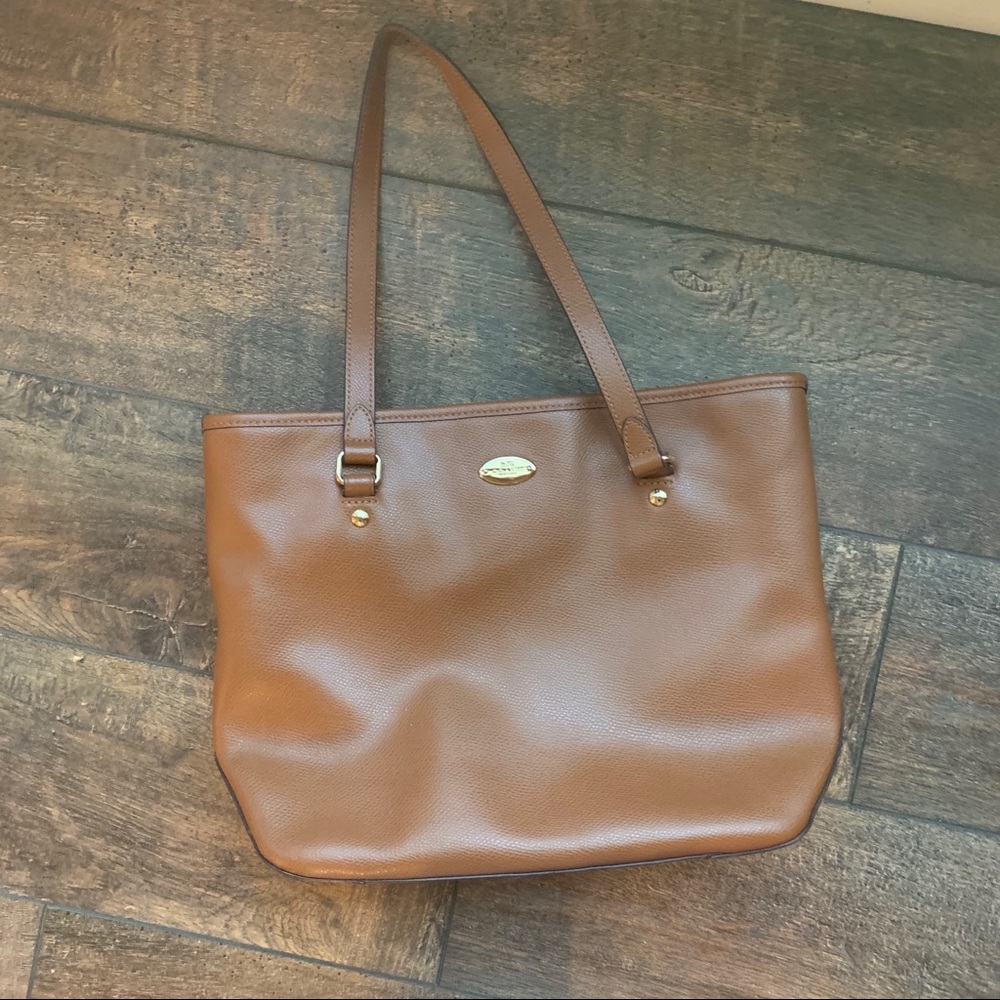 Coach purse.  Tan color. Excellent condition